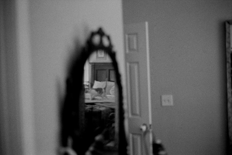 Harley Reflection — Home (2026). Black and white photograph by Jeff Pearson.