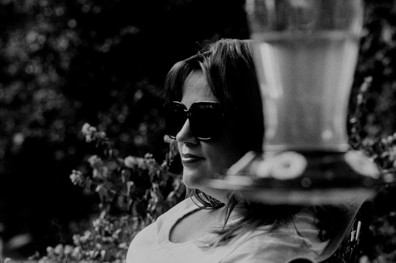 Hummingbird Feeder Portrait — Home (2026). Black and white photograph by Jeff Pearson.