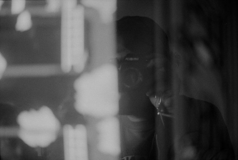 Kangaroo Arcade Self-Portrait — Home (2026). Black and white photograph by Jeff Pearson.